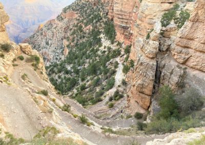 switchbacks dropping down a steep canyon