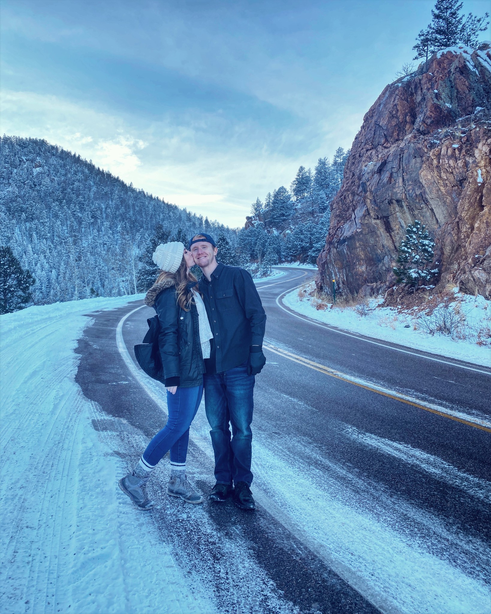 Couple Kissing on a Wintery Road