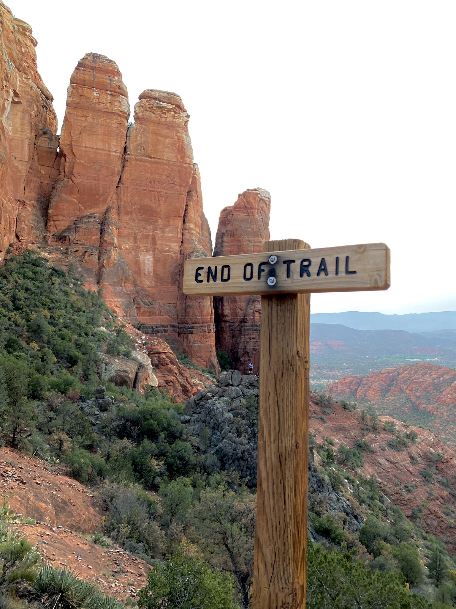 Brown End of Trail Sign Overlooking Canyon at Sunset