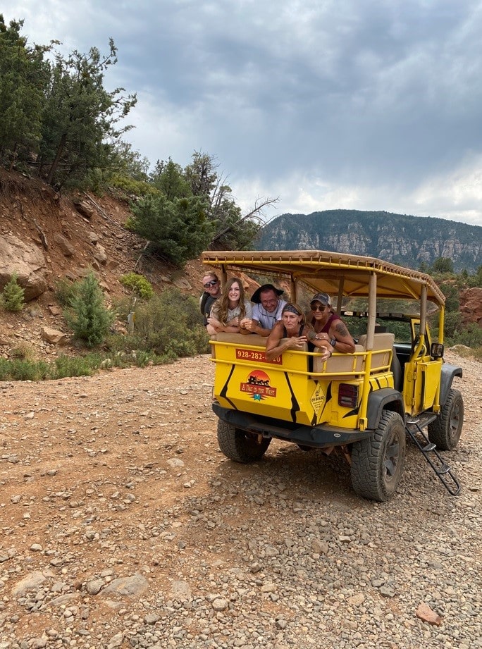 Group of People in a Yellow Jeep Tour in Sedona in Red Rocks