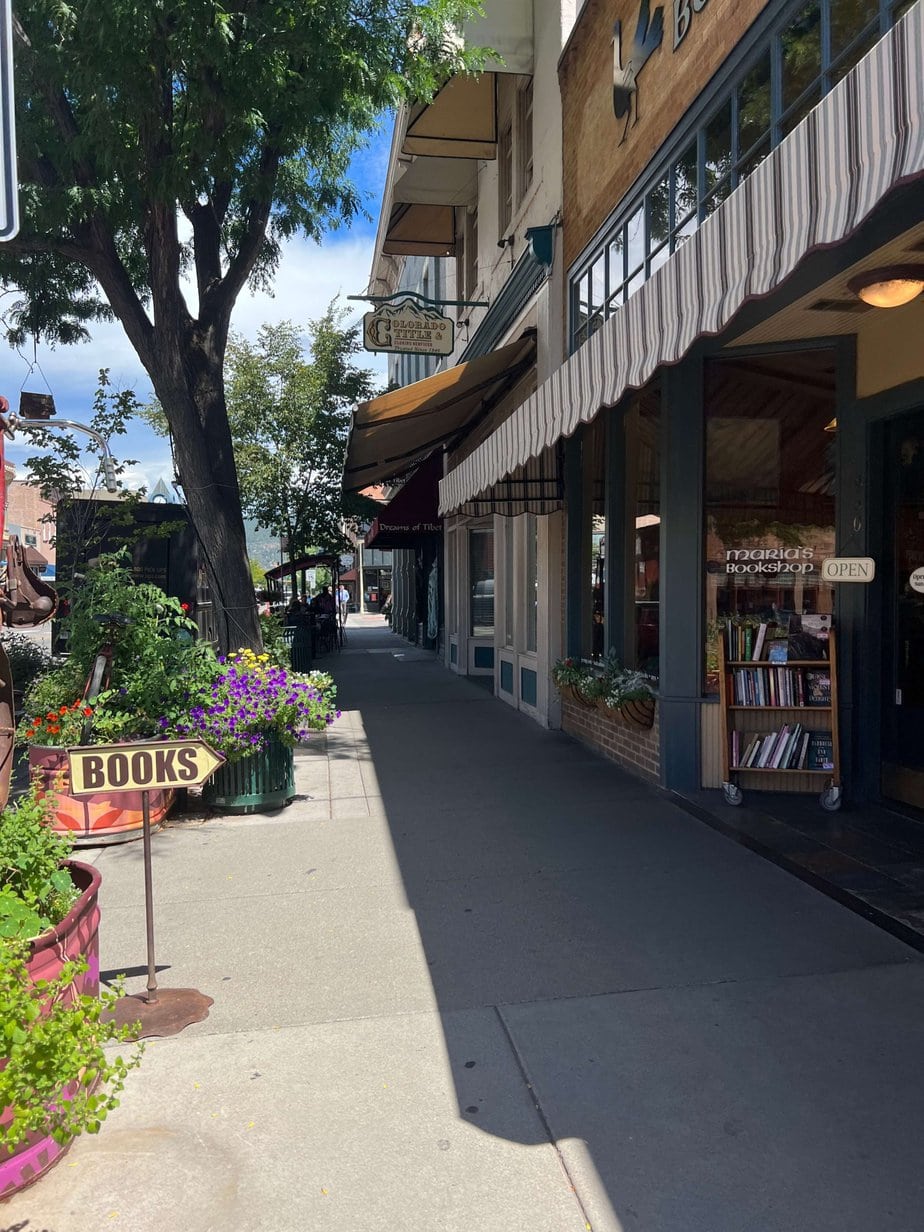 Stores Downtown on a Sunny Day with Flowers