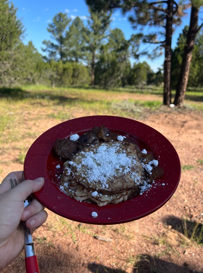 Red Plate with Pancakes in the Forest