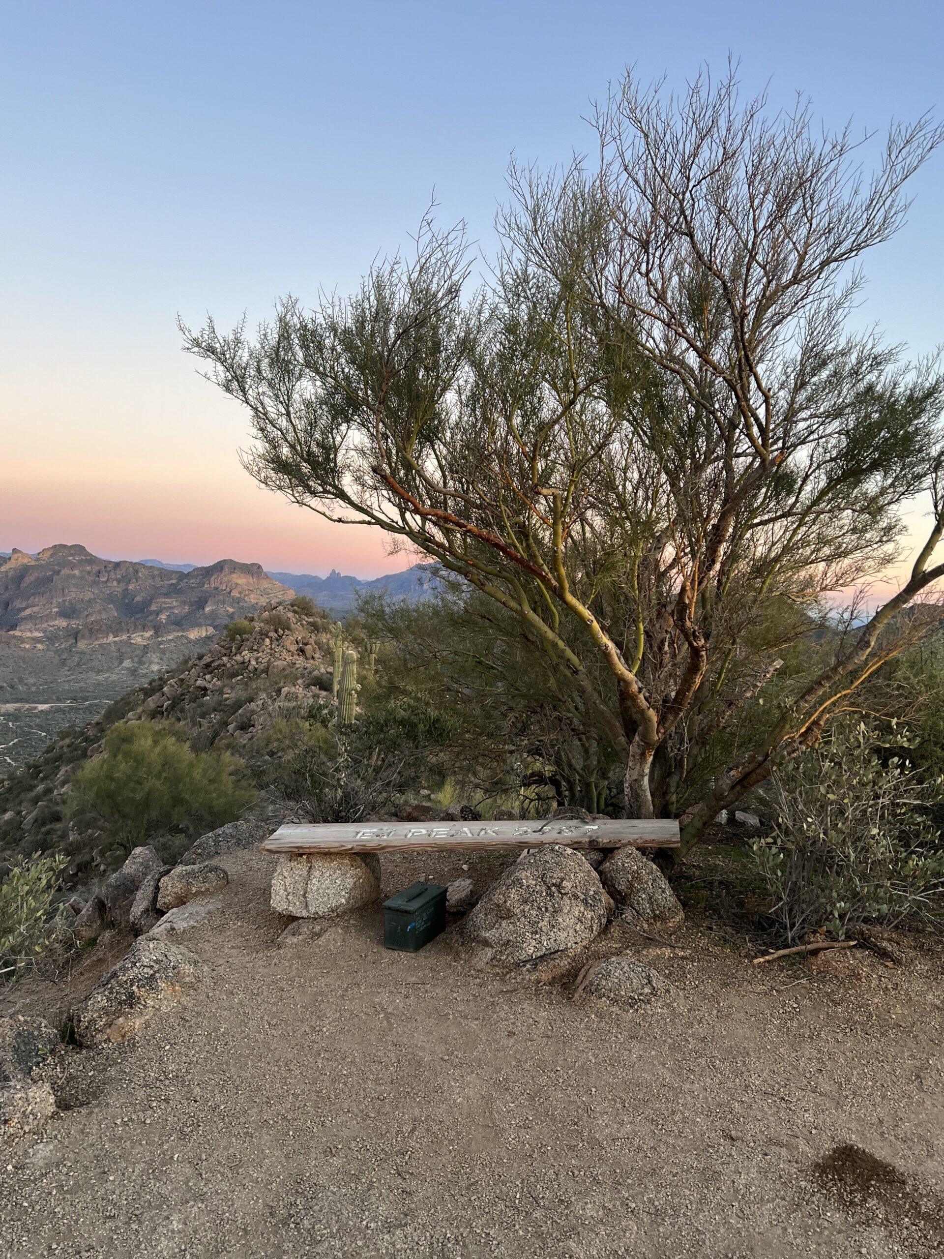 Bench at the Top of a Mountain at Sunset