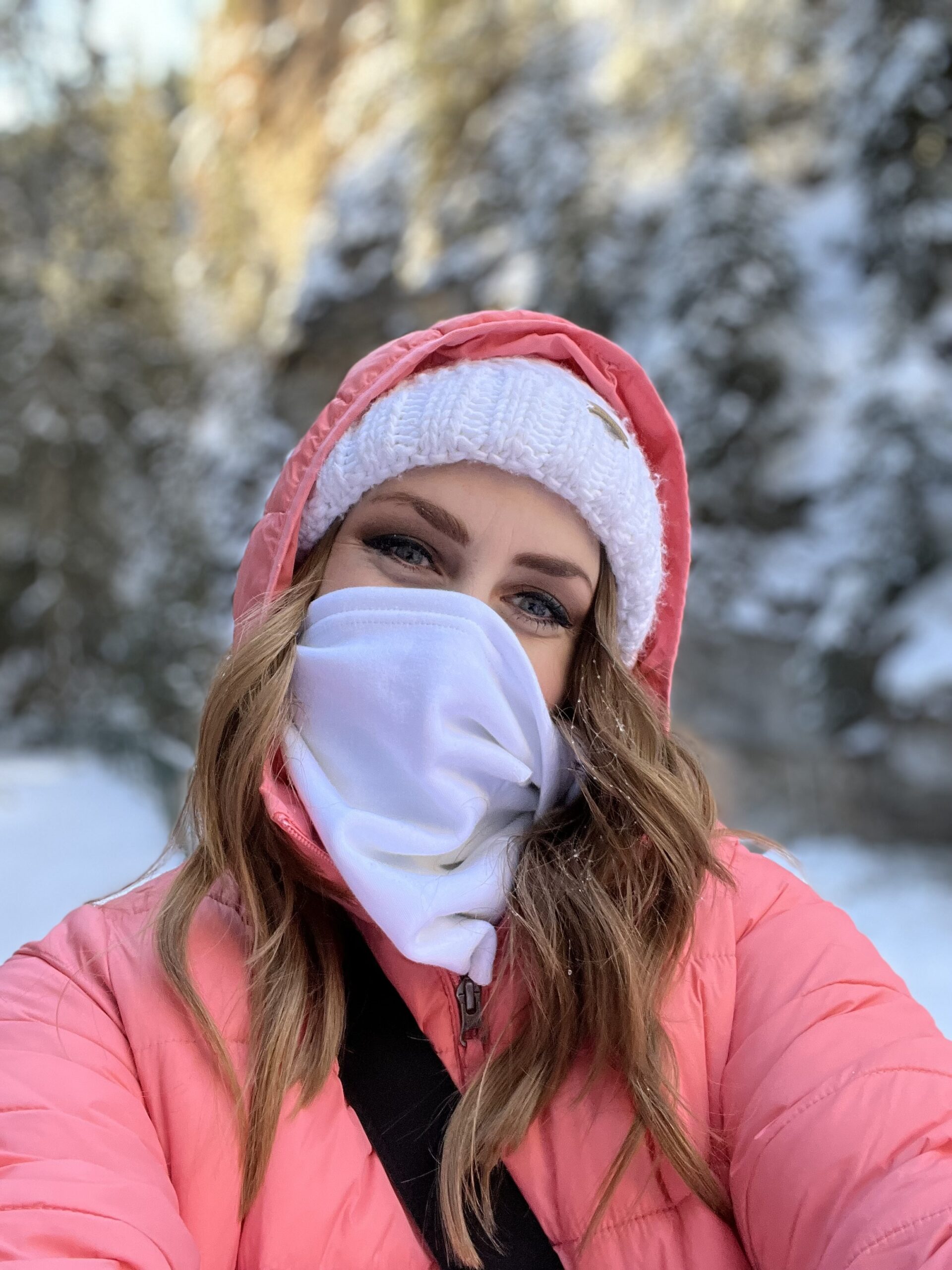 Girl in a Pink Coat Walking on a Walkway in the Forest