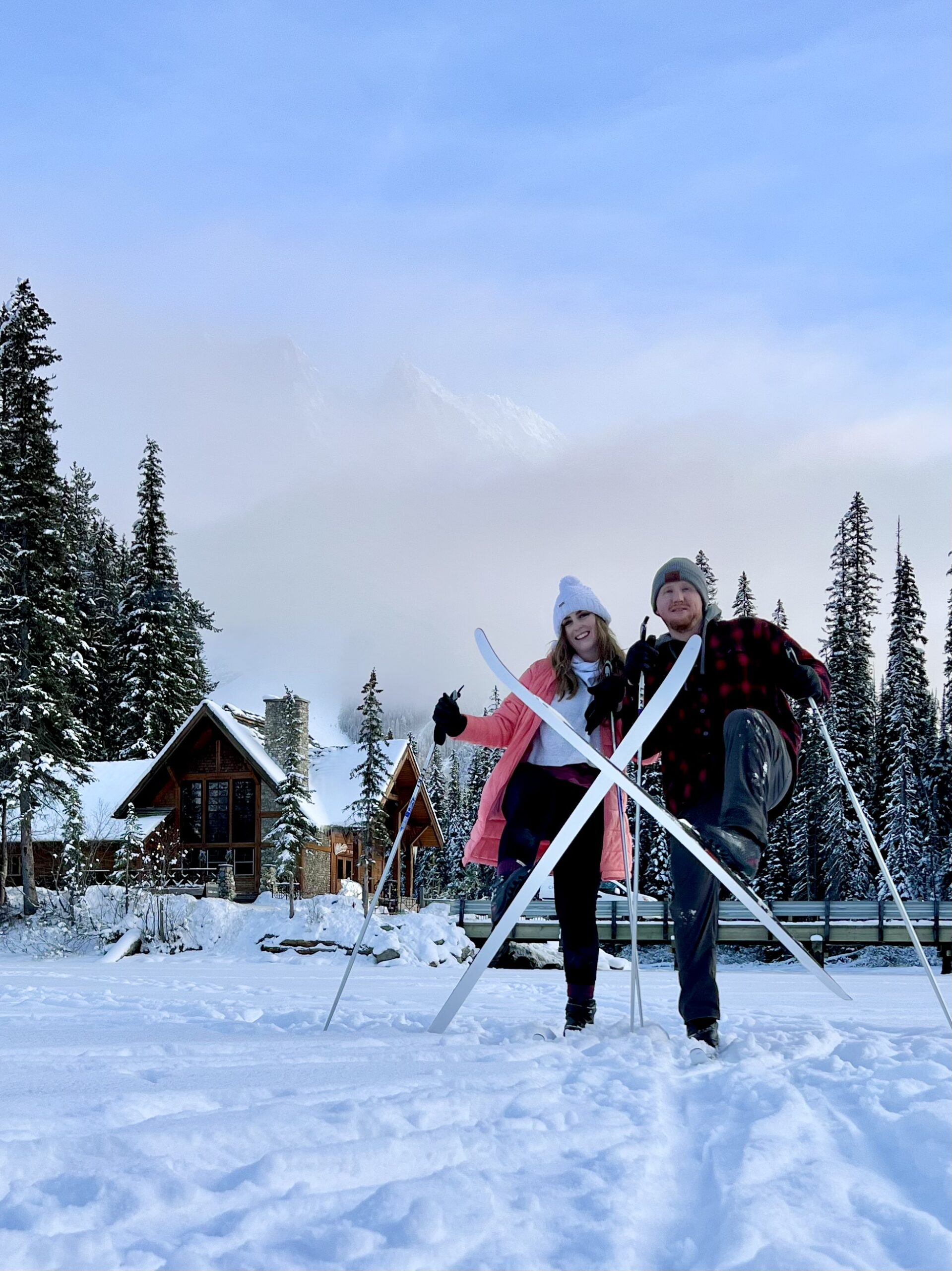 A Couple Touching Skiis in the Winter