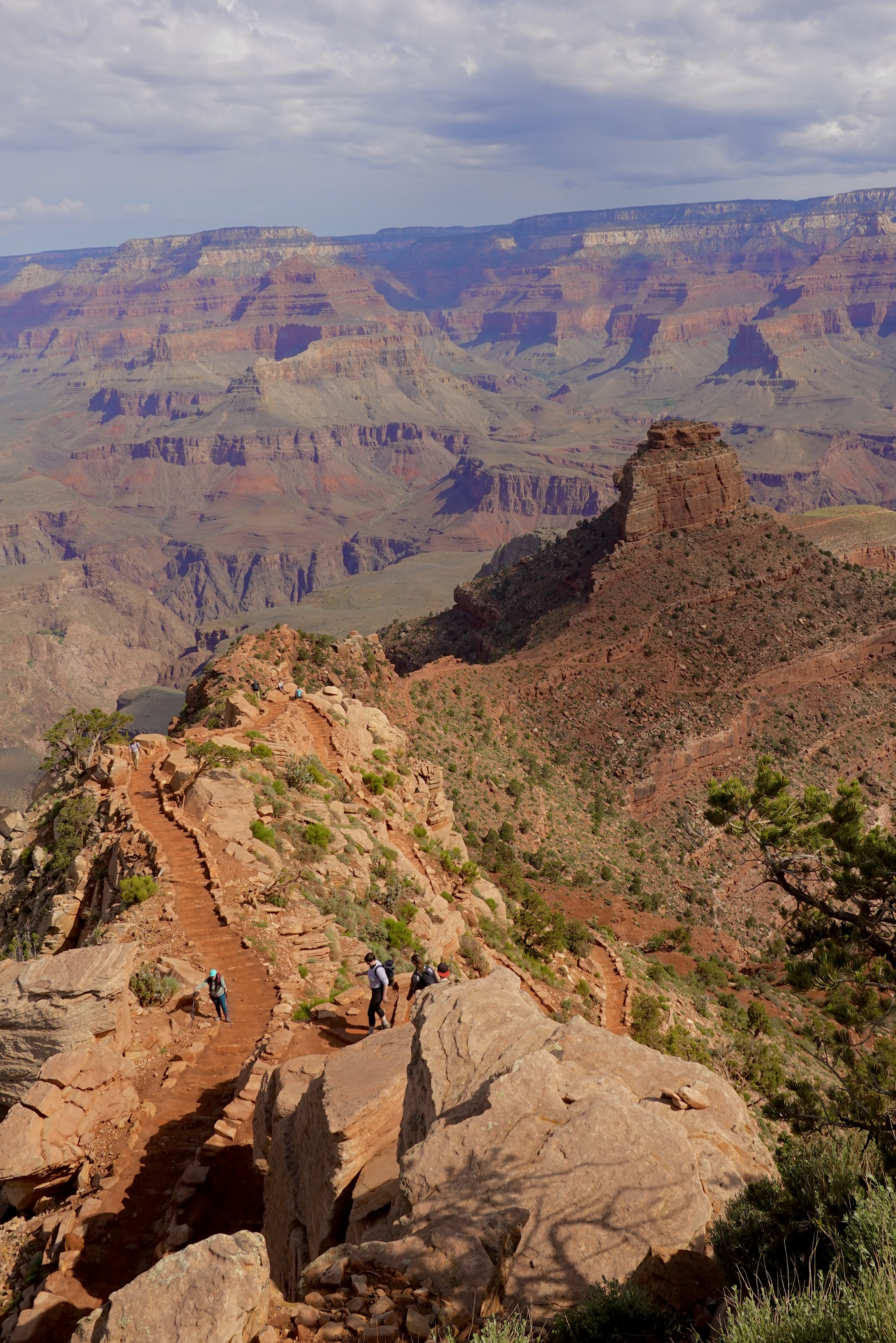 People Walking on the Ridge of the Grand Canyon