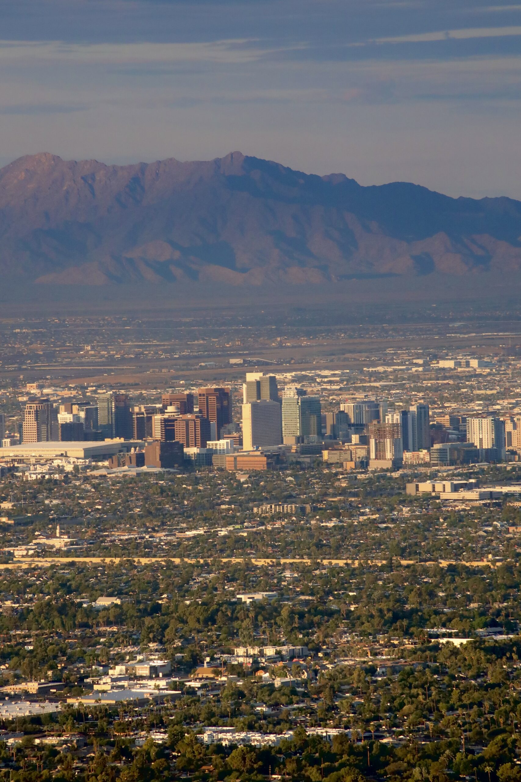 city views in front of the mountains