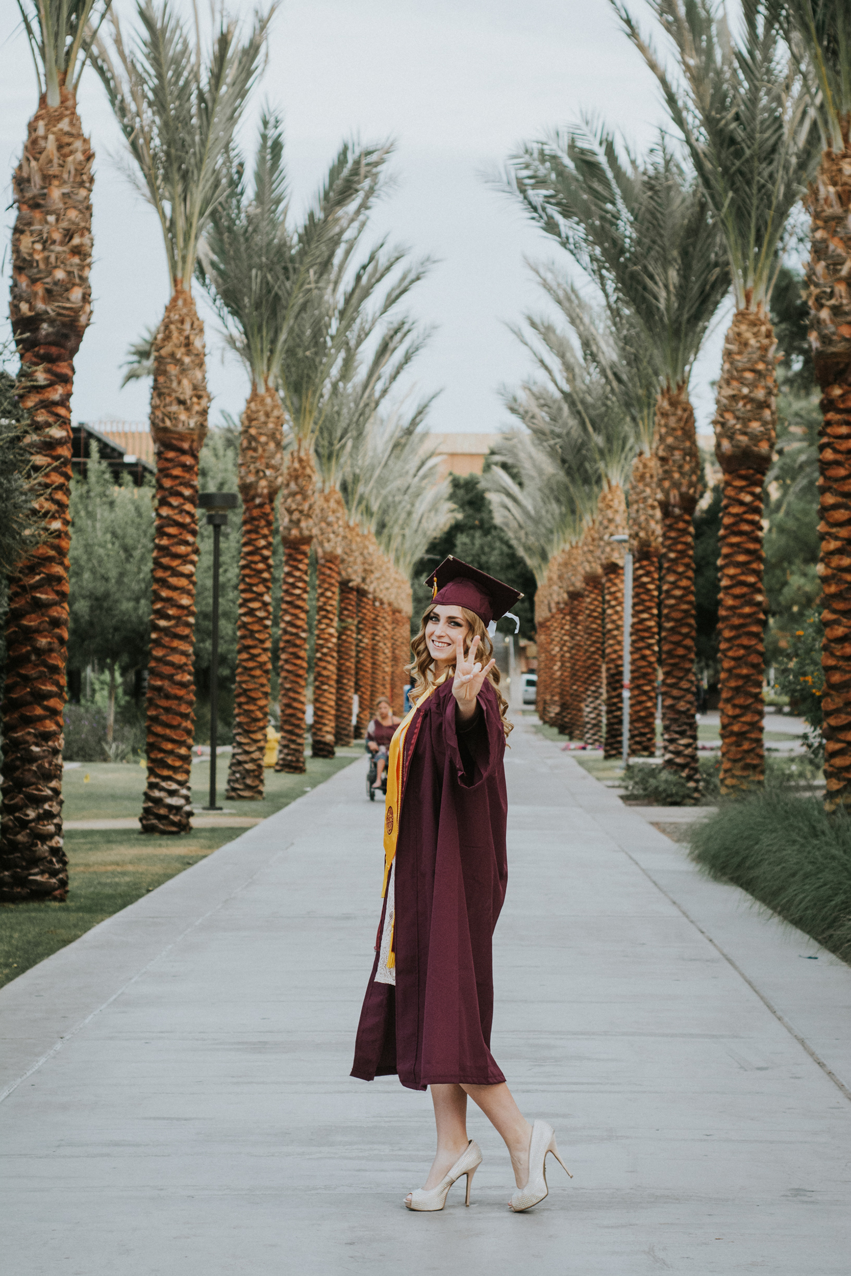 girl in arizona state university graduation gown