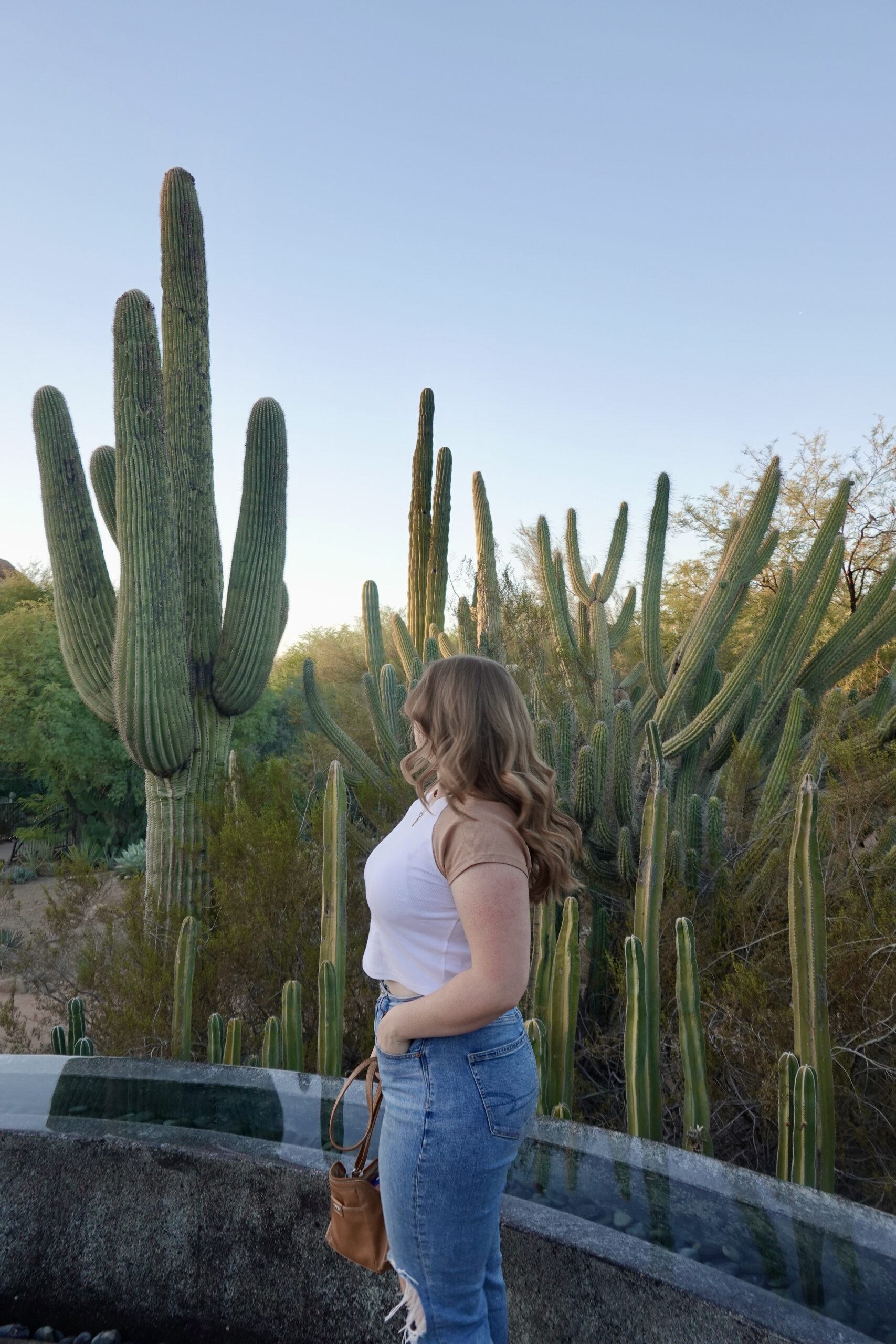 girl surrounded by cactus