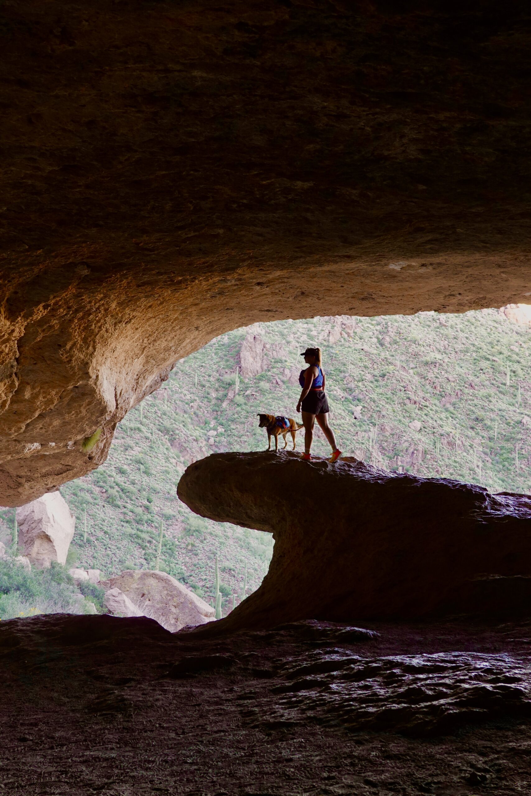 girl in a cave in the mountains