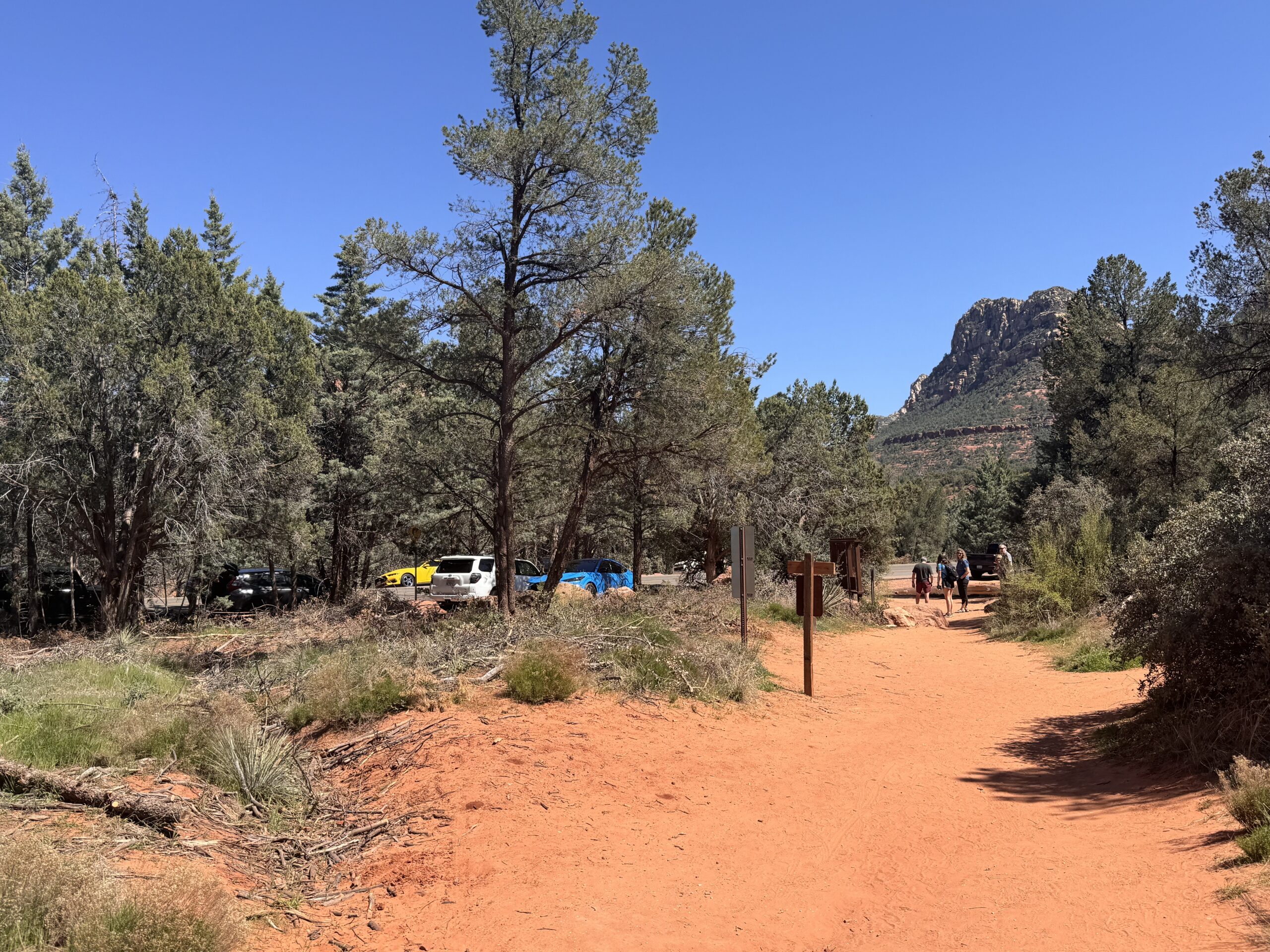 cars parked in sedona near a trail