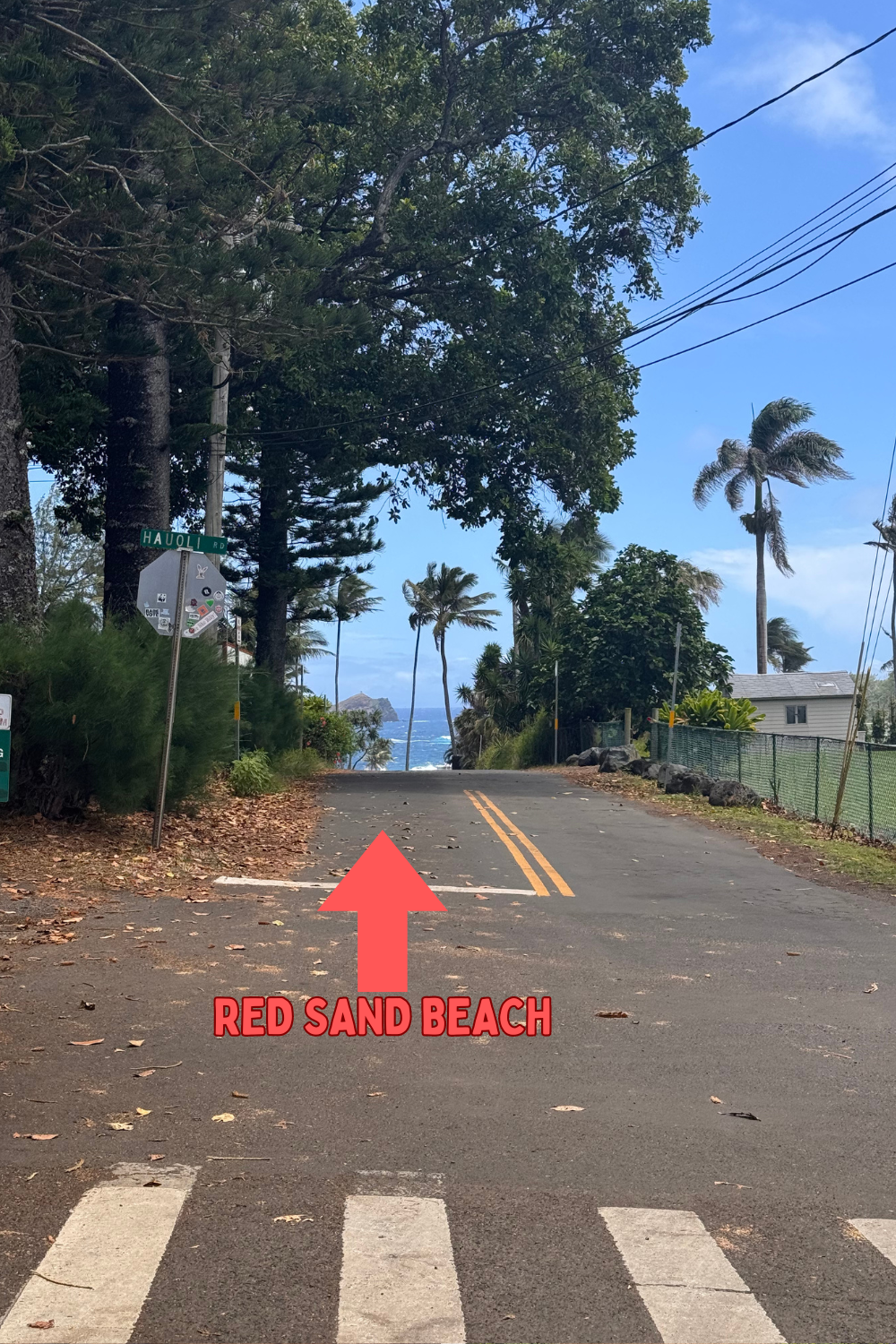 arrow pointing to red sand beach