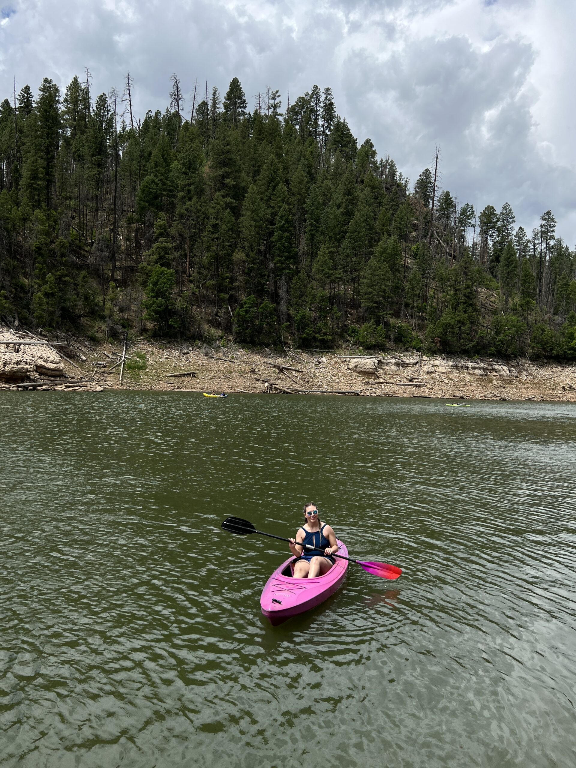 girl on a pink kayak