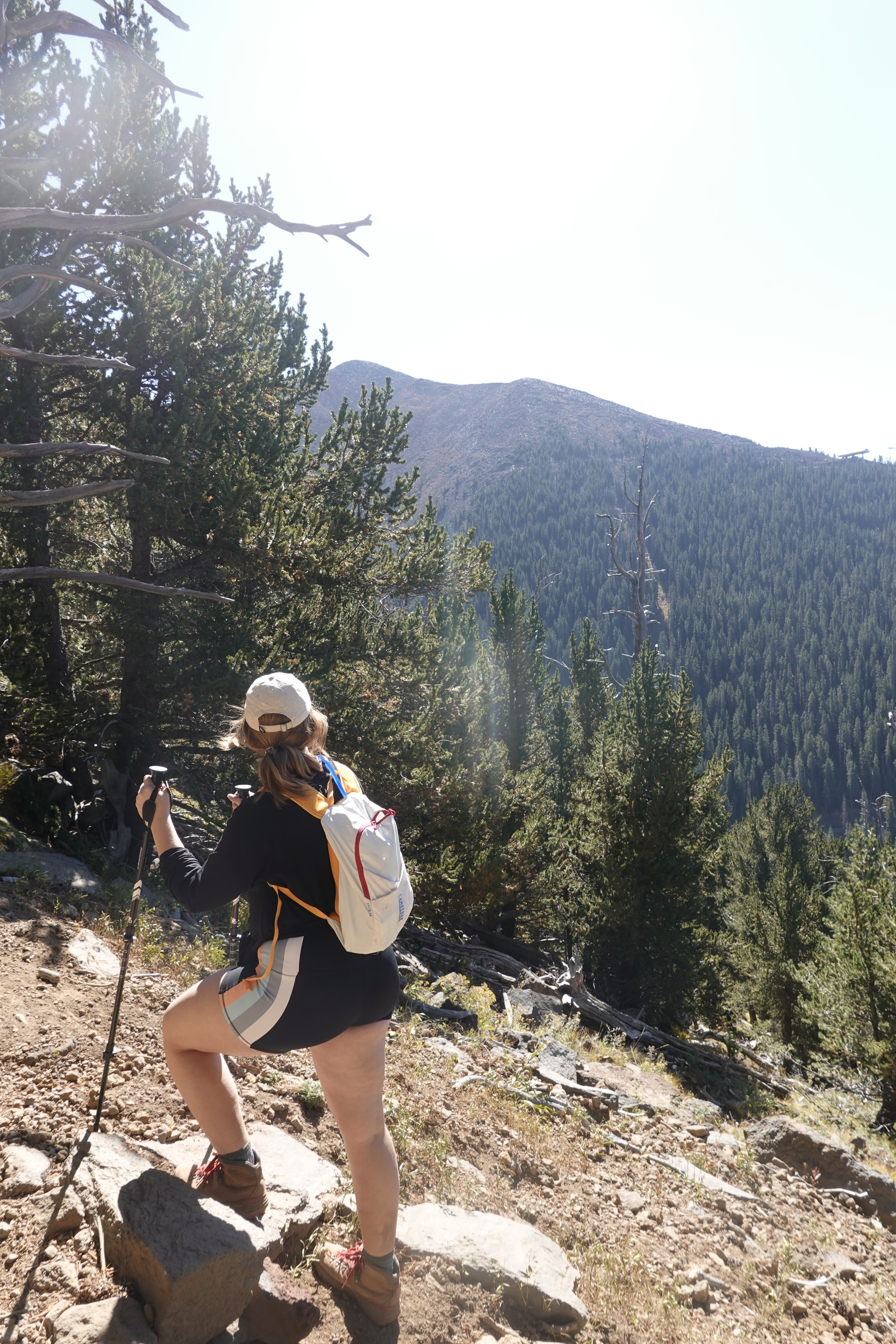 girl overlooking mountains in flagstaff arizona- humphreys peak