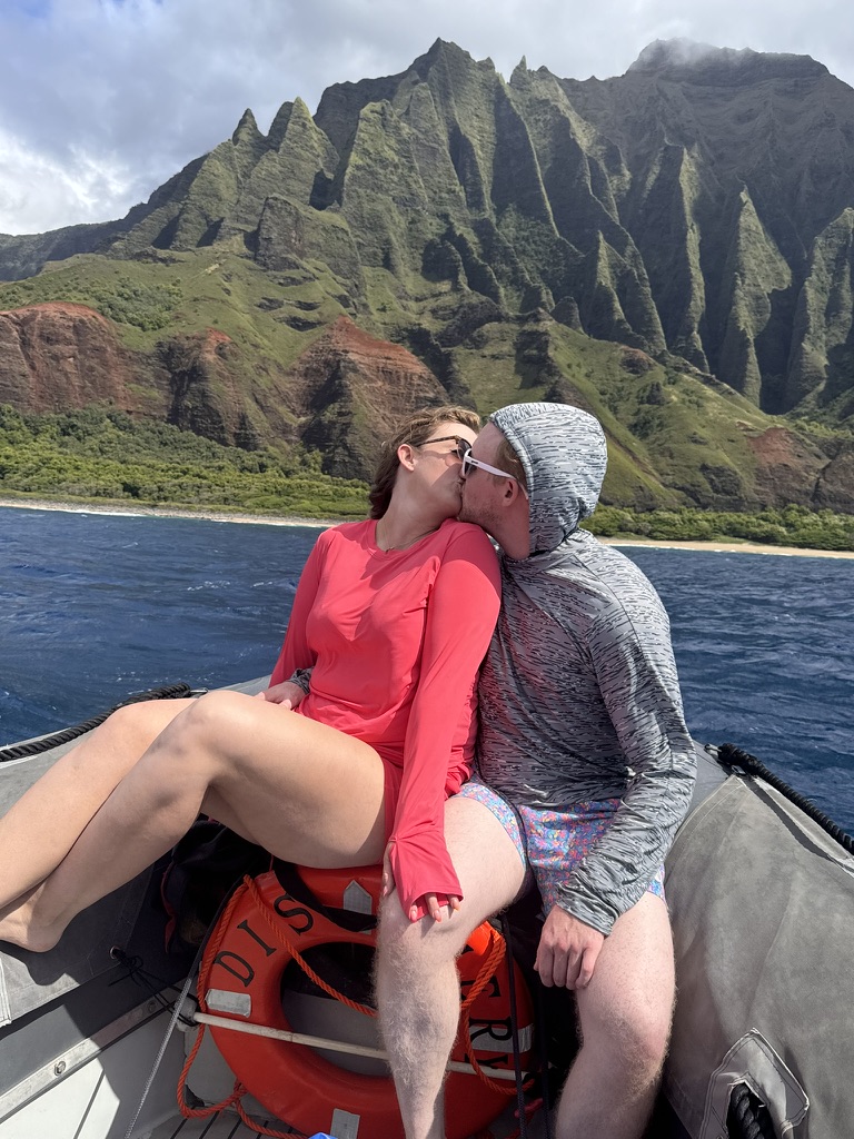 couple on a raft on the na pali coast