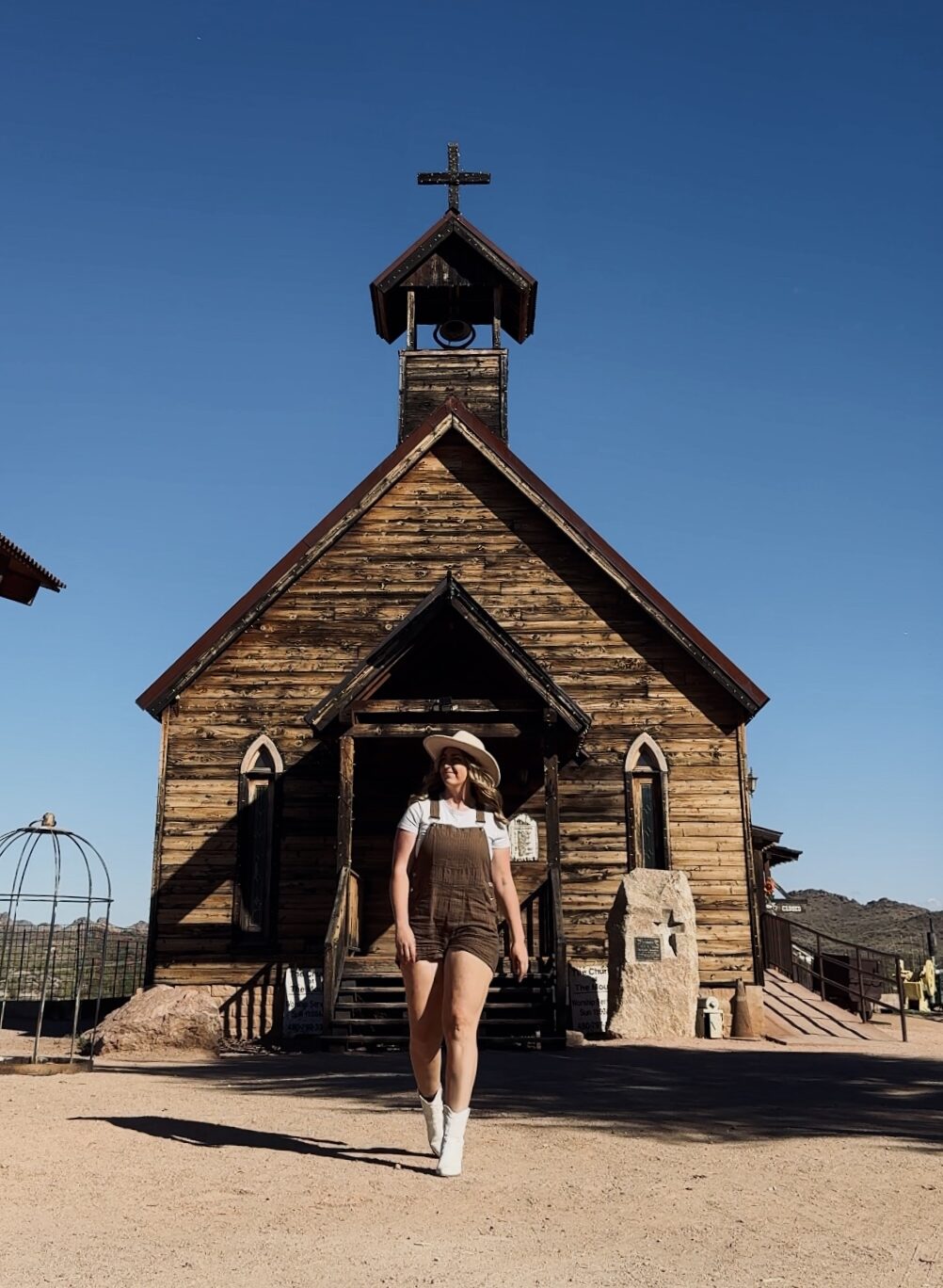 girl in front of an old chapel