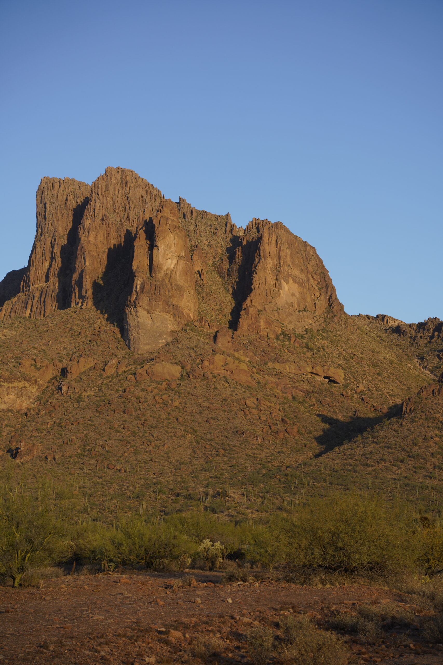 shadow of a shaka in the mountains in a clear sky