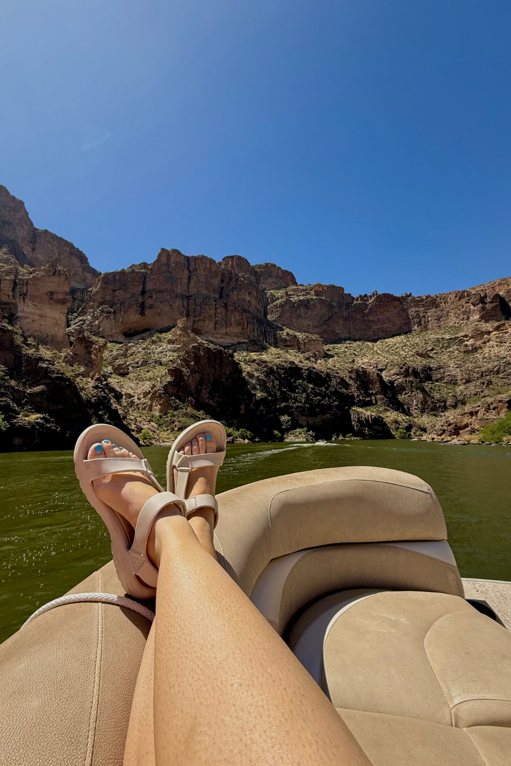 boat rental canyon lake a girls feet up on the boat at canyon lake in arizona