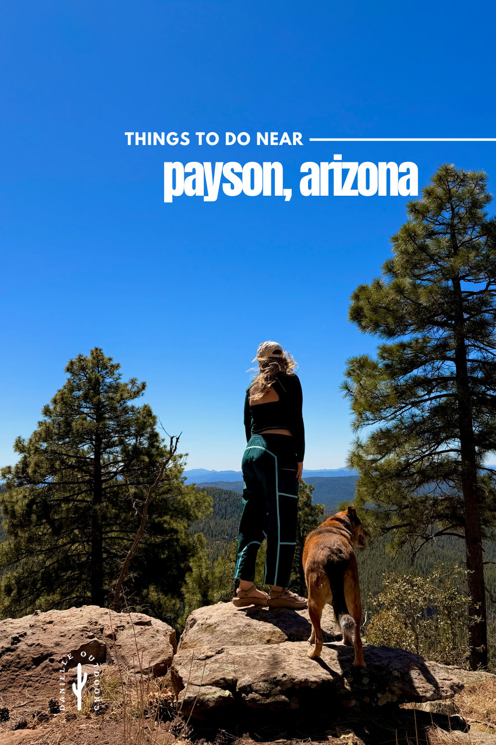woman and dog standing on a rock overlooking ponderosa pine forest near Payson Arizona