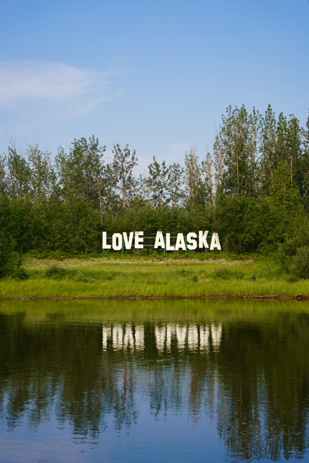 love alaska letters making up a sign amongst trees