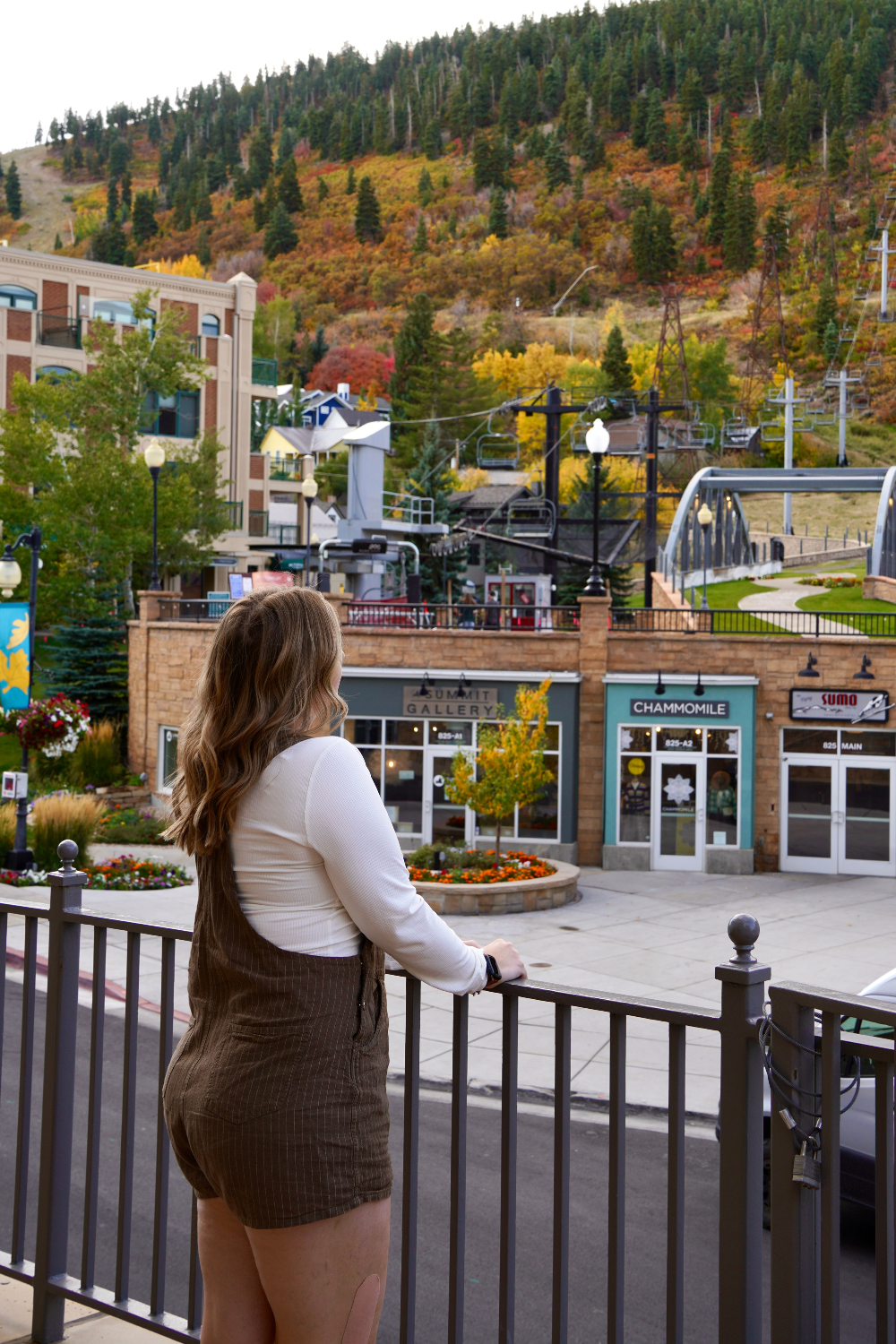 girl standing overlooking downtown park city