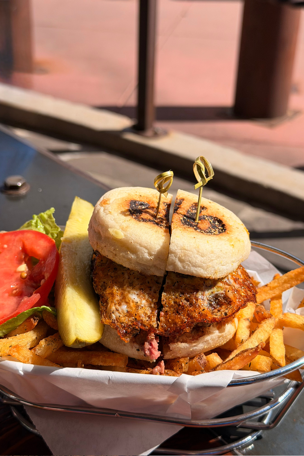 photo of a burger and fries
