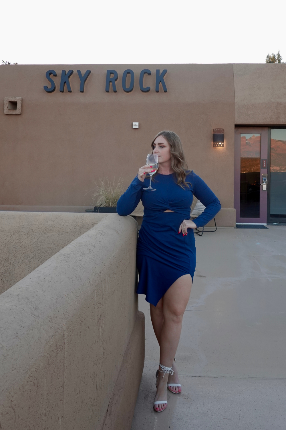 photo of a girl drinking wine at a hotel in sedona
