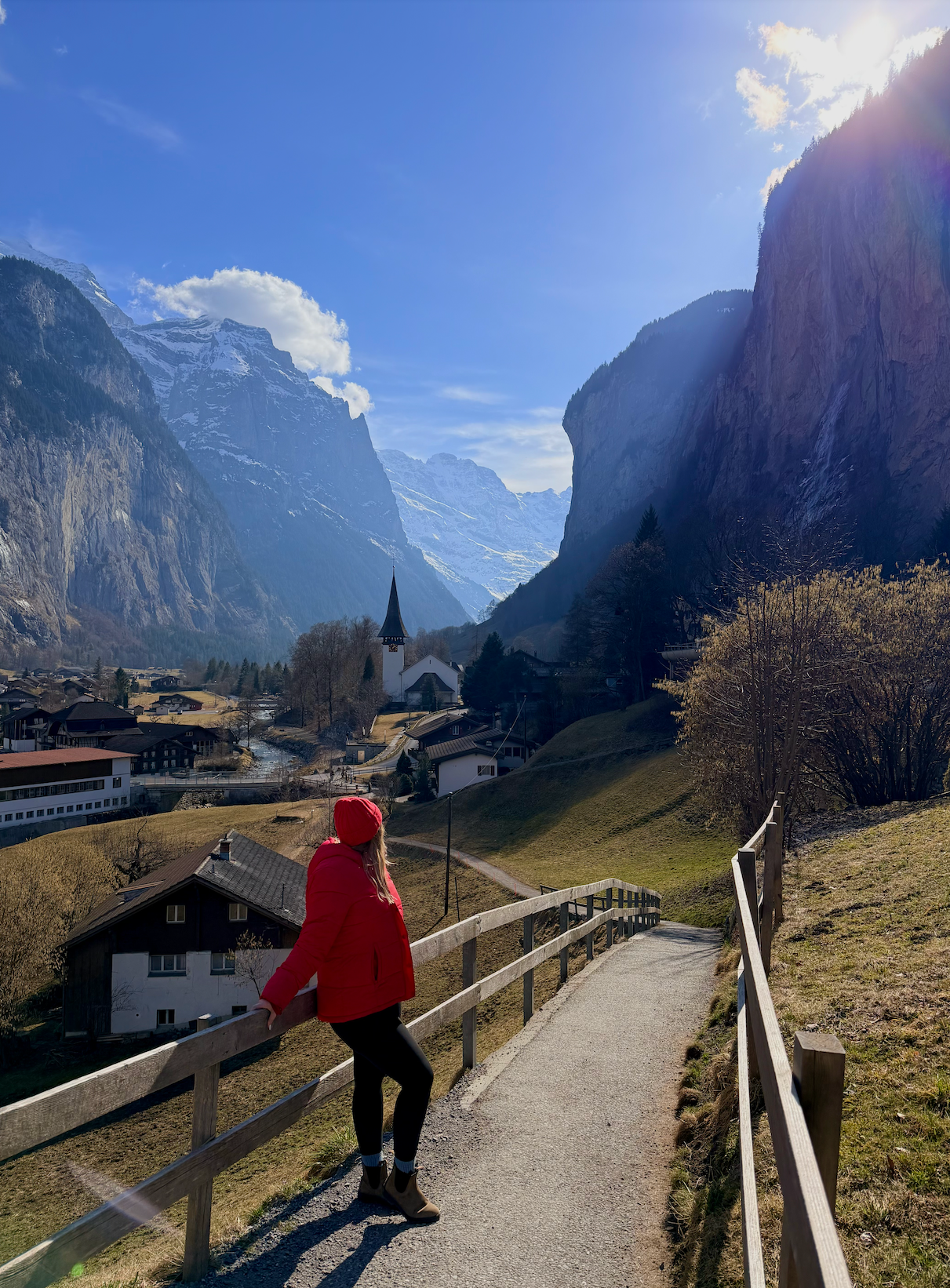 girl standing in lauterbrunnen, switzerland